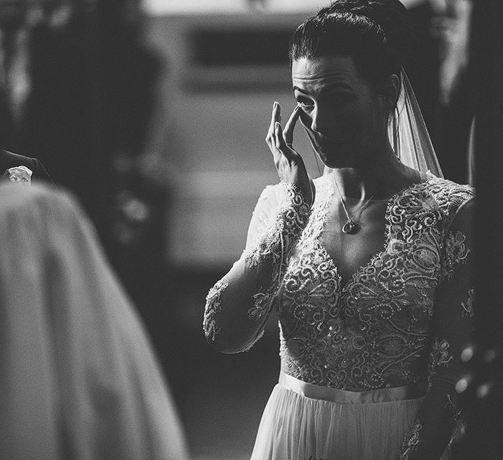 Emtional Bride in Camellia Suzanne Neville Gown at the Altar