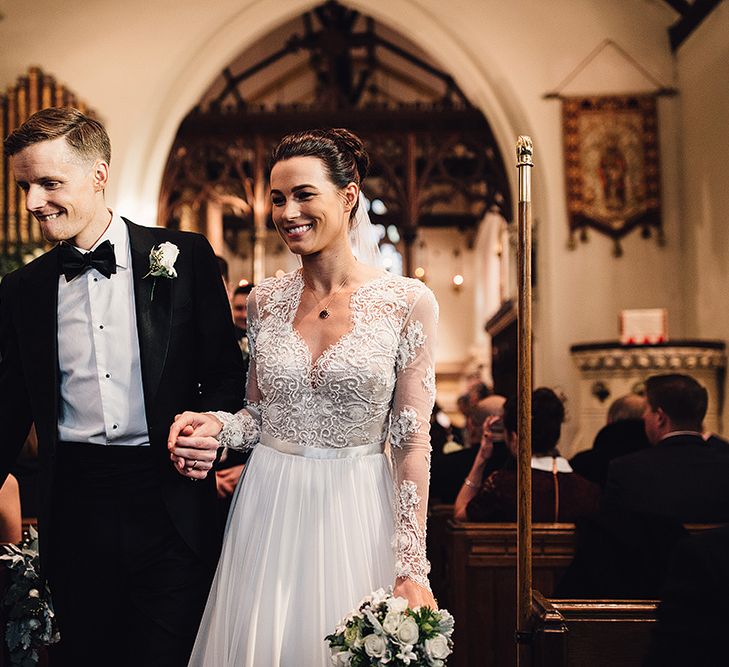 Bride in Camellia Suzanne Neville Gown & Groom in SuitSupply Tuxedo