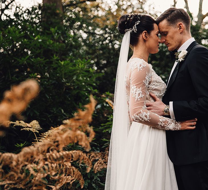 Bride in Camellia Suzanne Neville Gown & Groom in SuitSupply Tuxedo