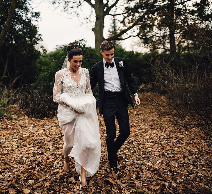 Bride in Camellia Suzanne Neville Gown & Groom in SuitSupply Tuxedo