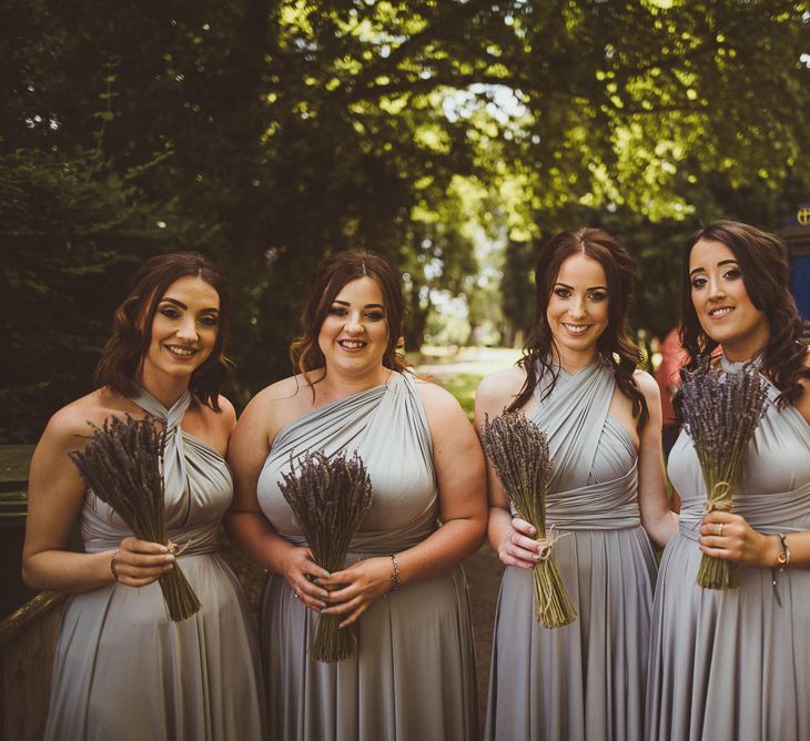 Bridesmaids in Grey Multiway Dresses | PapaKåta Tipi at Angrove Park North Yorkshire | Matt Penberthy Photography