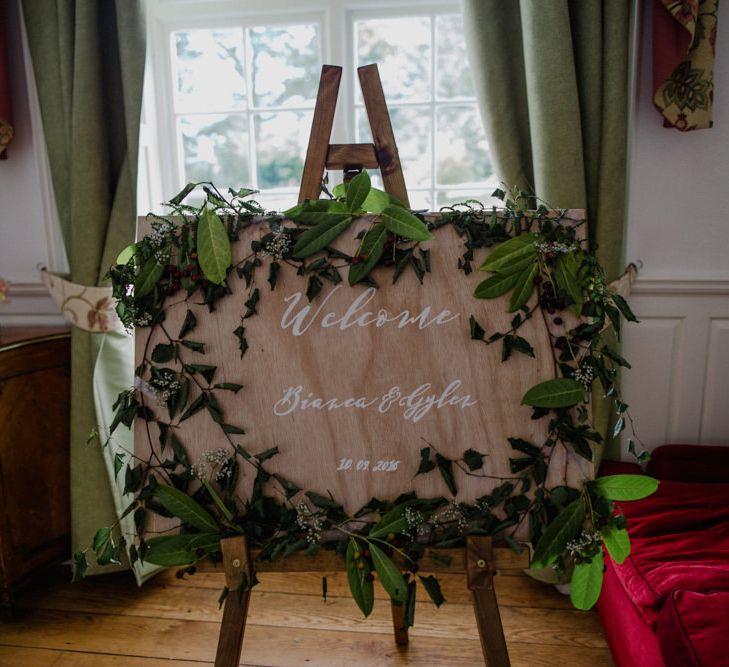 Wood Floral Garland Wedding Sign | Woodland Themed Wedding at Achnagairn Estate near Inverness, Scotland | Zoe Alexander Photography