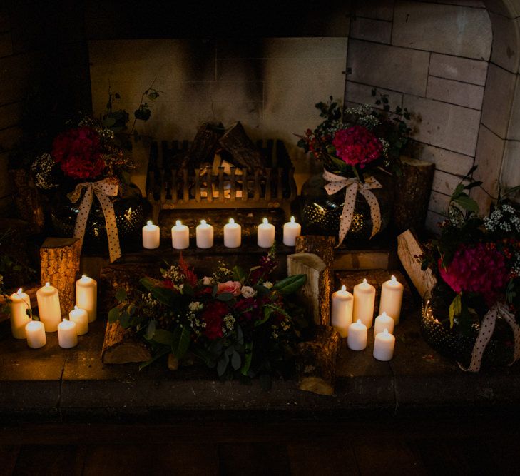 Church Candles & Red Flower Decor | Woodland Themed Wedding at Achnagairn Estate near Inverness, Scotland | Zoe Alexander Photography