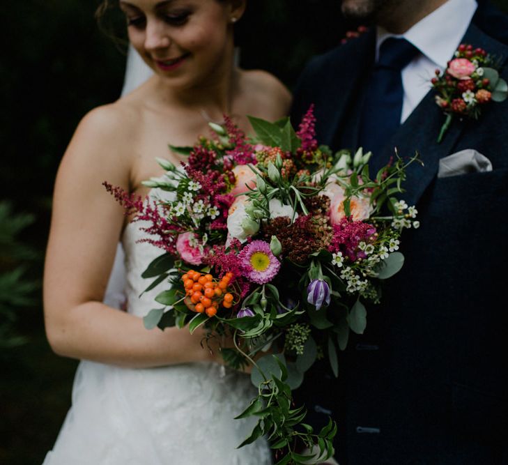 Red Bridal Bouquet | Bride in Modeca Bridal Gown | Groom in Tartan Kilt | Woodland Themed Wedding at Achnagairn Estate near Inverness, Scotland | Zoe Alexander Photography