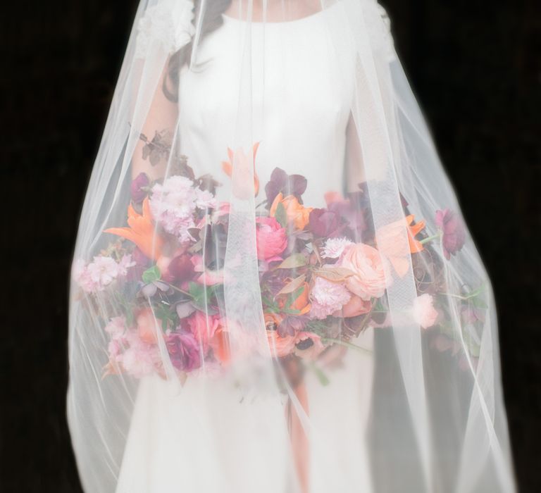 Brightly Coloured Bridal Bouquet And Jesus Peiro Gown For An Elegant Barn Wedding