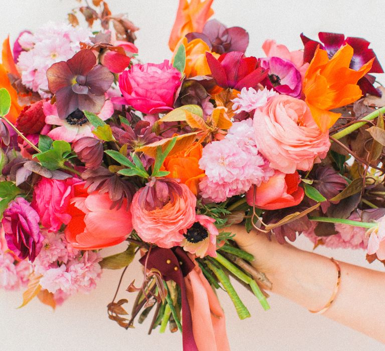 Brightly Coloured Bridal Bouquet And Jesus Peiro Gown For An Elegant Barn Wedding