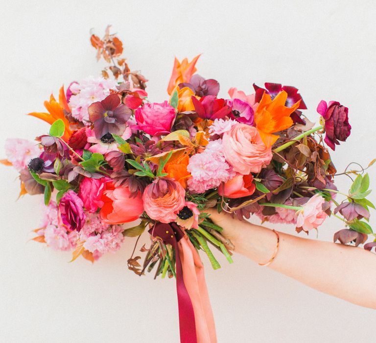 Brightly Coloured Bridal Bouquet And Jesus Peiro Gown For An Elegant Barn Wedding