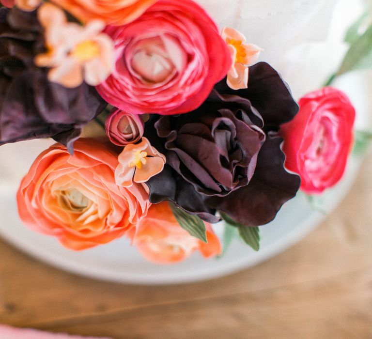 Wedding Cake With Brightly Coloured Sugar Flowers