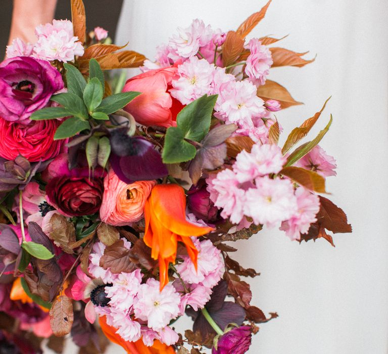 Brightly Coloured Bridal Bouquet And Jesus Peiro Gown For An Elegant Barn Wedding