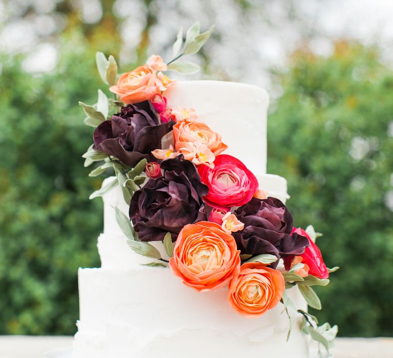 Wedding Cake With Brightly Coloured Sugar Flowers