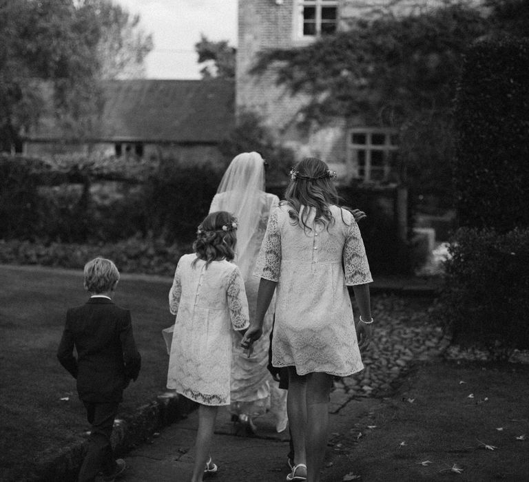 Bride in Rue De Seine Wedding Dress