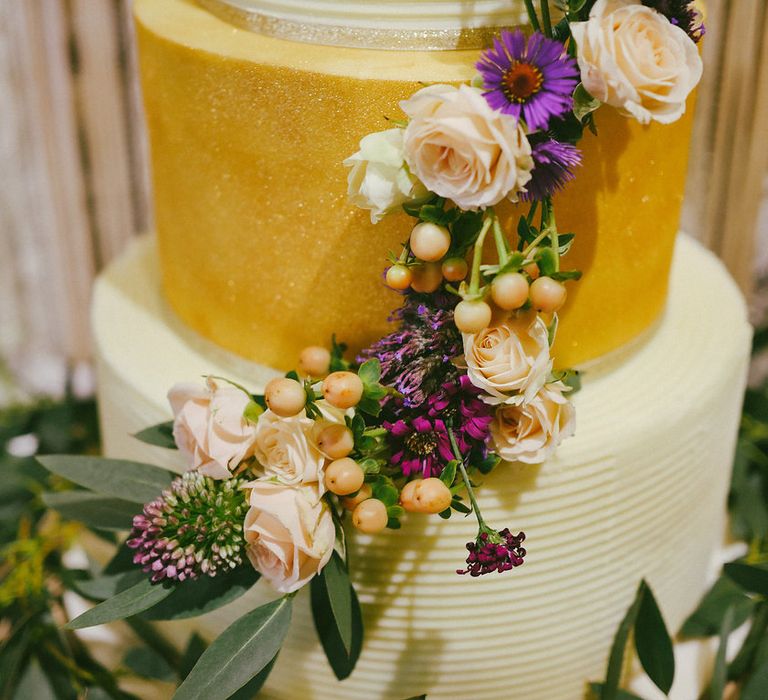 Gold Wedding Cake With Fresh Flowers