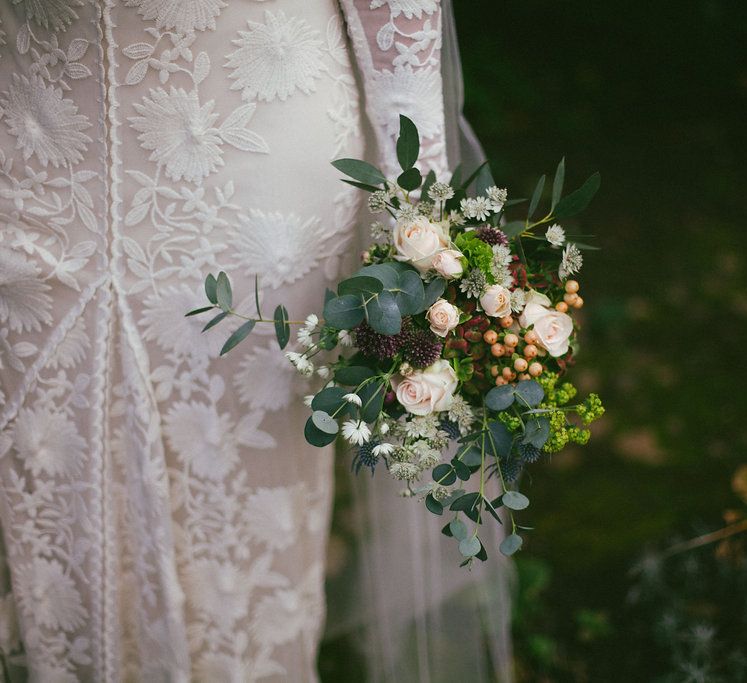 Bride in Rue De Seine Wedding Dress