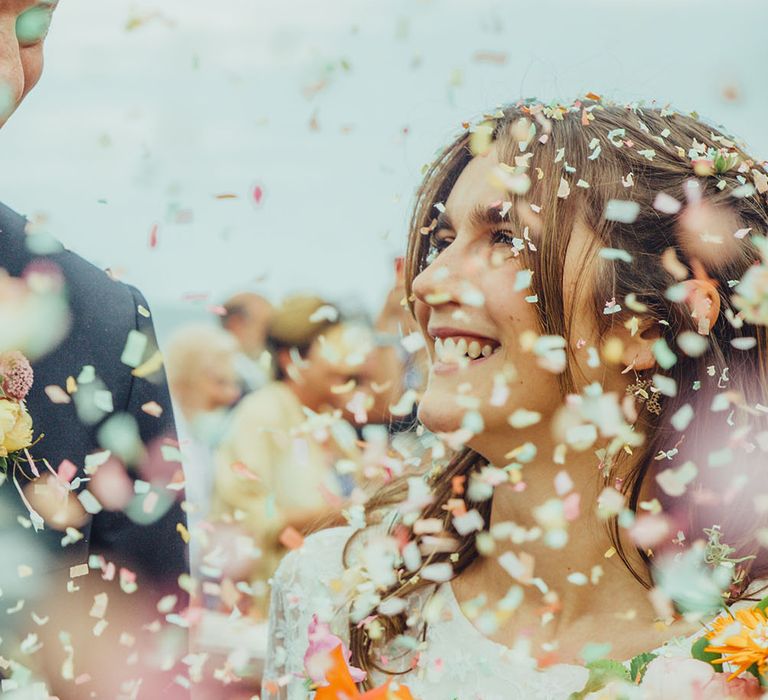 Confetti Moment | Bride in Elizabeth Avey Bridal Gown | Groom in Paul Smith Suit | Bright Coastal Wedding at East Quay Venue in Whitstable | Deborah Grace Photography