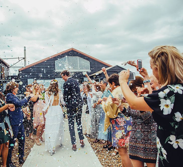 Confetti Moment | Bride in Elizabeth Avey Bridal Gown | Groom in Paul Smith Suit | Bright Coastal Wedding at East Quay Venue in Whitstable | Deborah Grace Photography