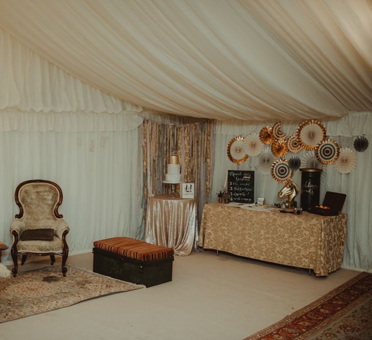 Vintage Furniture Seating Area In Marquee For Wedding