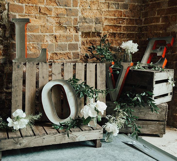 Rustic Wedding Decor With Wooden Palettes