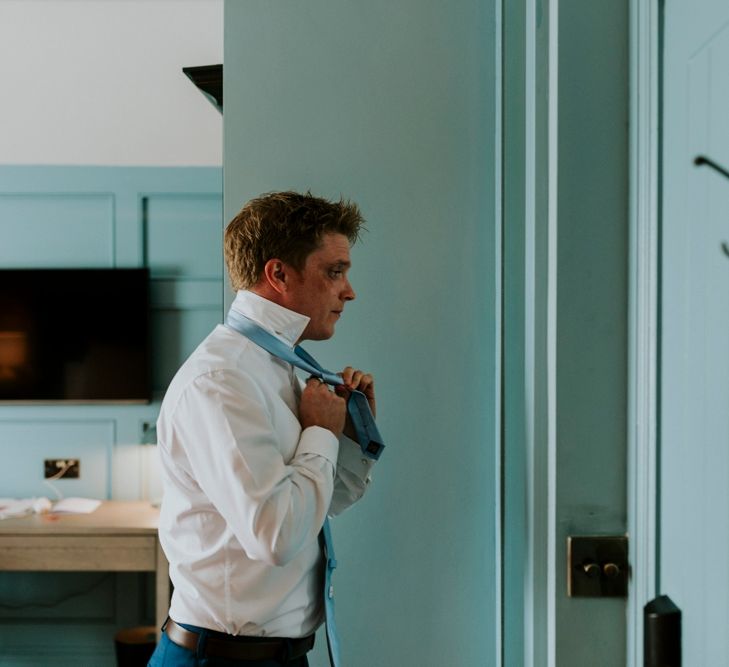 Groom in T.M Lewin Navy Suit | Benjamin Stuart Photography