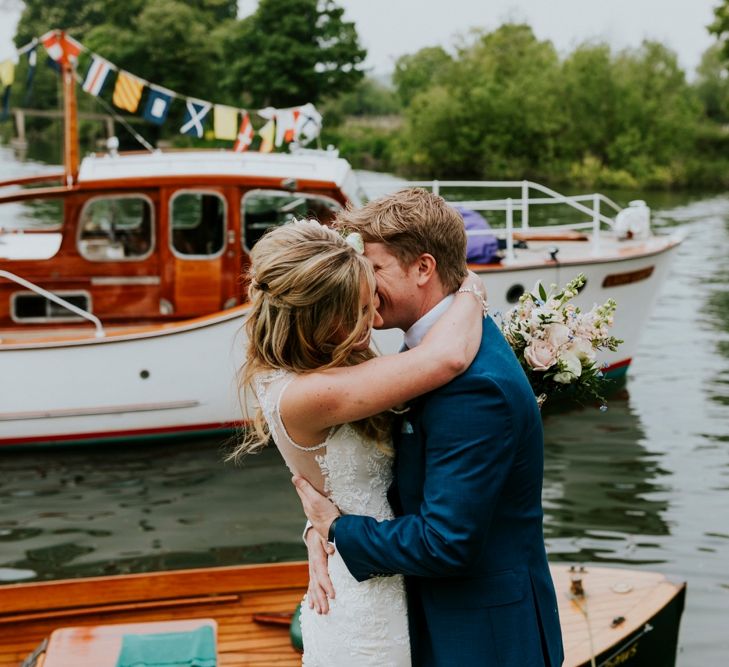 Bride in Lace Lillian West Wedding Dress | Groom in T.M Lewin Navy Suit | Benjamin Stuart Photography