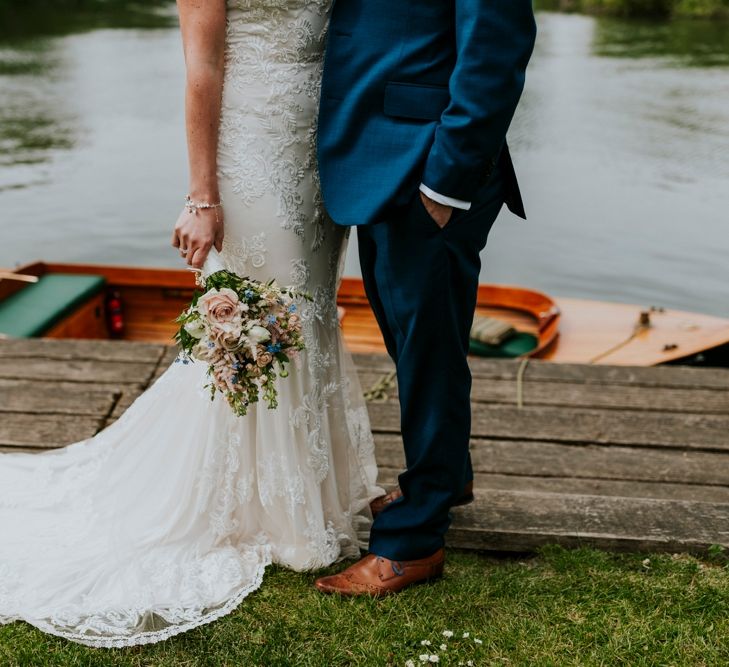 Bride in Lace Lillian West Wedding Dress | Groom in T.M Lewin Navy Suit | Benjamin Stuart Photography