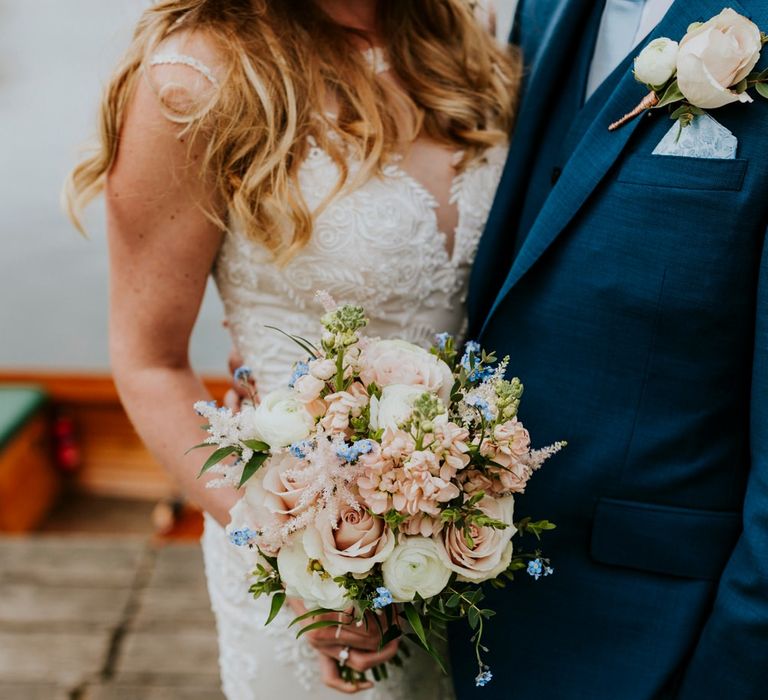 Blush Pink Wedding Bouquet | Bride in Lace Lillian West Wedding Dress | Groom in T.M Lewin Navy Suit | Benjamin Stuart Photography