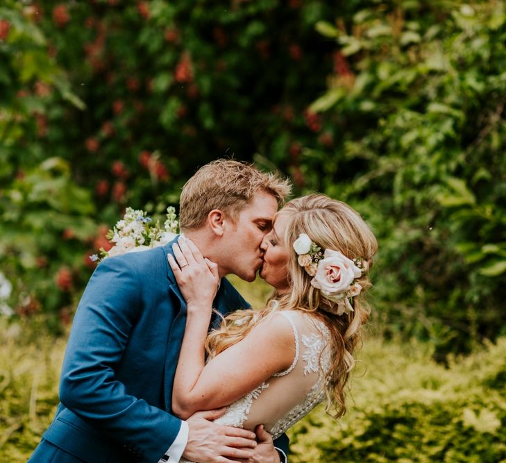 Bride in Lace Lillian West Wedding Dress | Groom in T.M Lewin Navy Suit | Benjamin Stuart Photography