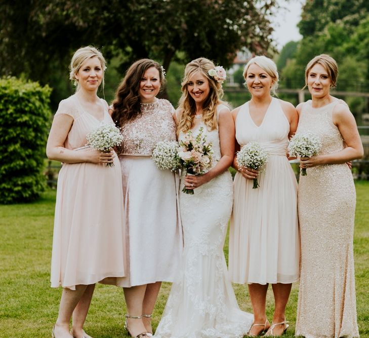 Bridesmaids in Highstreet Nude Dresses | Bride in Lace Lillian West Bridal Gown | Benjamin Stuart Photography