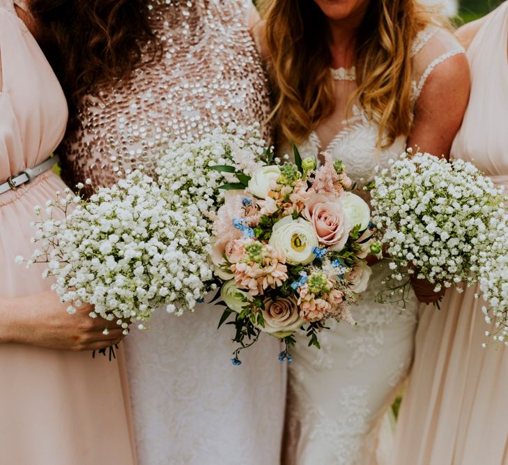 Gypsophila Bouquets | Bridesmaids in Highstreet Nude Dresses | Bride in Lace Lillian West Bridal Gown | Benjamin Stuart Photography