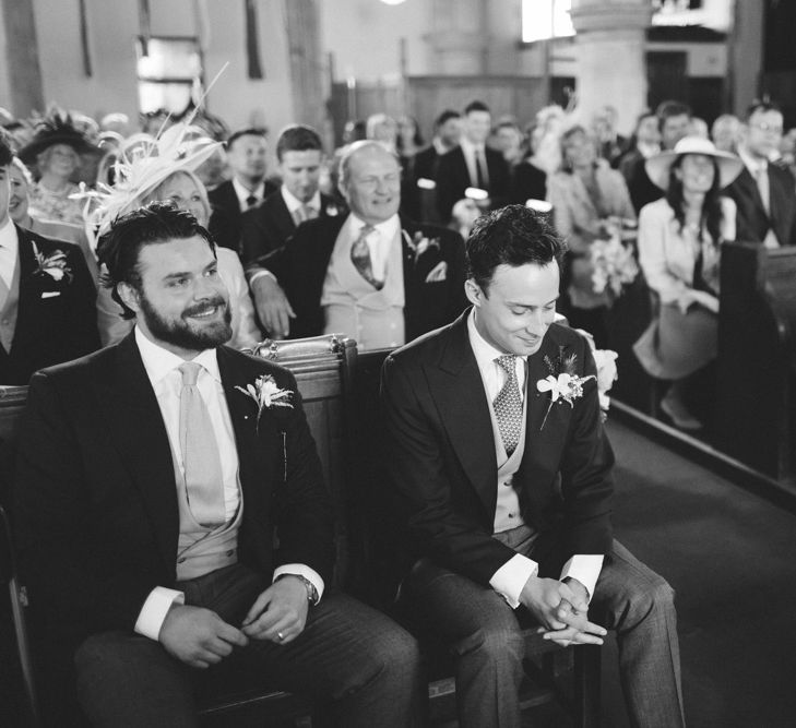 Groom in Traditional Morning Suit at the Church Altar