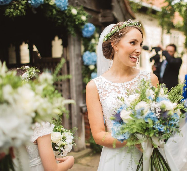 Bride in Lace Bodice & Ingrida Bridal Wedding Dress with Blue & White Hydrangea & Stock Bouquet