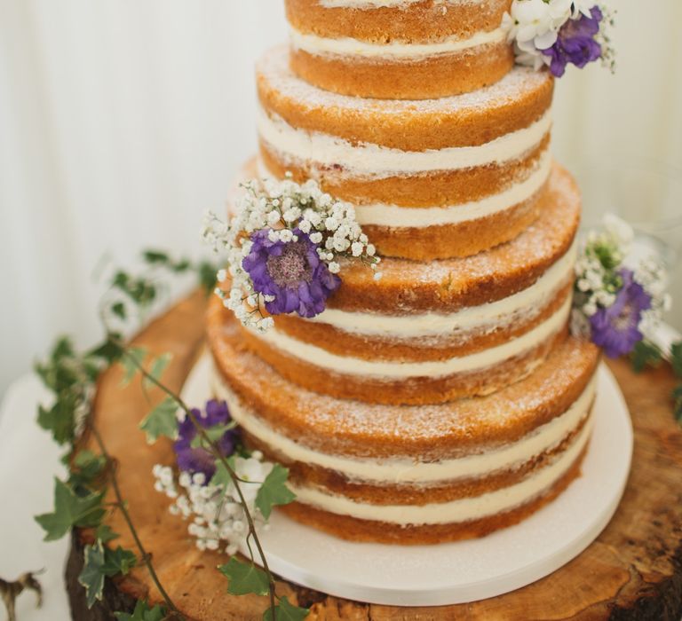 Naked Wedding Cake Decorated with Flowers