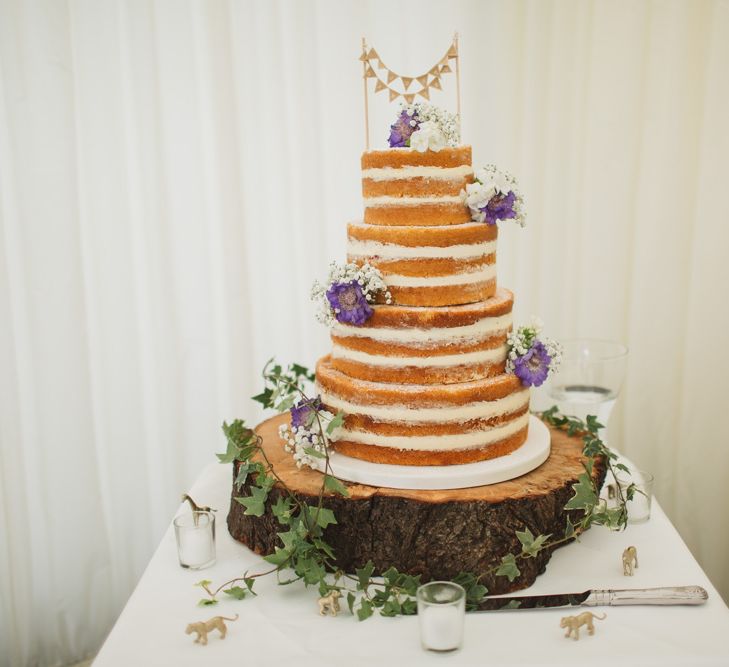 Naked Wedding Cake on a Tree Stump Cake Stand