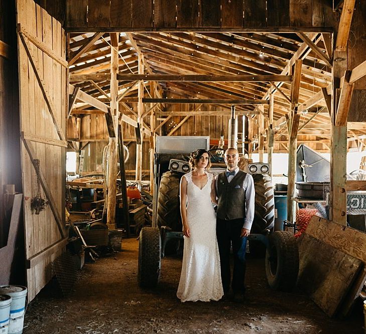 DIY At Home Farm Wedding with Rustic Decor & Wild Flowers | Lace Stella York Wedding Dress | Gloria Byler Photography