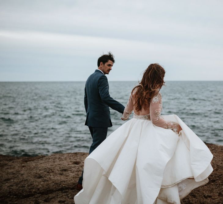 After Wedding Portraits at Portland Bill, Dorset | Bride in Miss Hayley Paige Bridal Gown | Groom in Navy Ted Baker Suit | Green Antlers Photography | Gione Da Silva Film