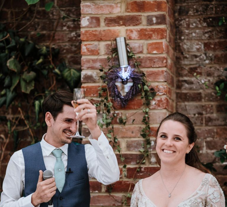 Bride in Miss Hayley Paige Bridal Gown | Groom in Navy Ted Baker Suit | Natural Wedding at Northbrook Park, Surrey | Green Antlers Photography | Gione Da Silva Film