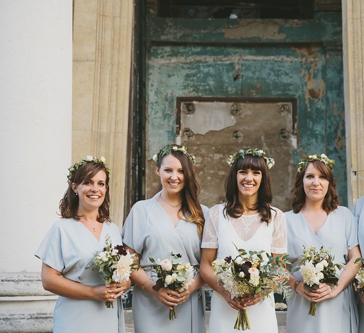 Bride In Charlie Brear Wedding Dress & Bridesmaids In Baby Blue Dresses