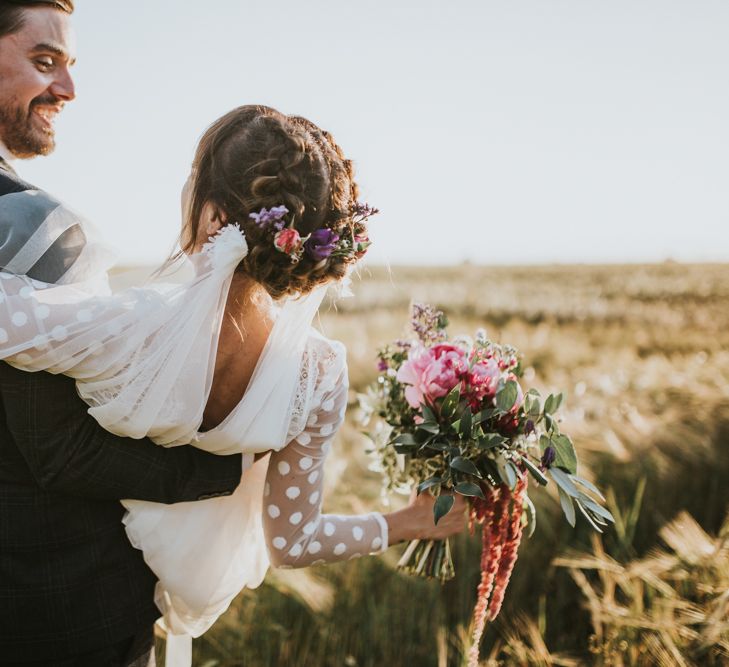 Bridal Up Do with Flowers | Katya Katya Gown | Groom in Ted Baker Suit | Fishley Hall Rustic Barn Wedding | Darina Stoda Photography