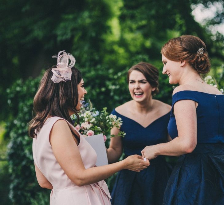 Preston Court Wedding With Bride In Sassi Holford & Groom In Checked Suit By Jack Bunneys With Images From Claire Penn Photography