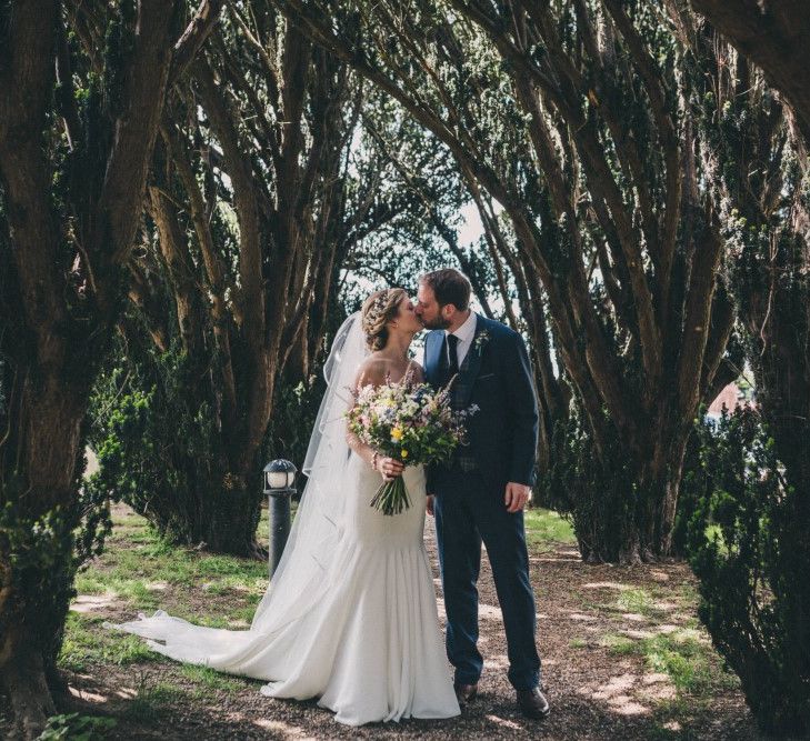 Preston Court Wedding With Bride In Sassi Holford & Groom In Checked Suit By Jack Bunneys With Images From Claire Penn Photography