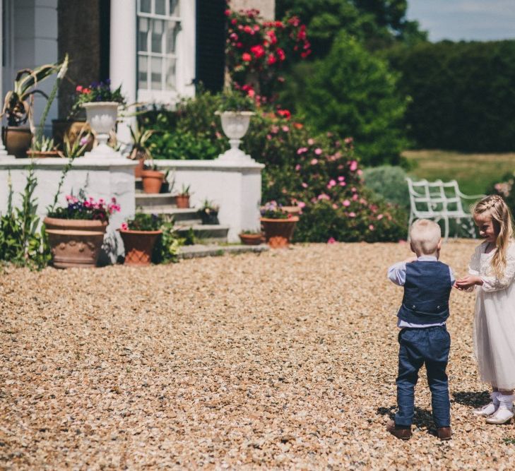 Preston Court Wedding With Bride In Sassi Holford & Groom In Checked Suit By Jack Bunneys With Images From Claire Penn Photography