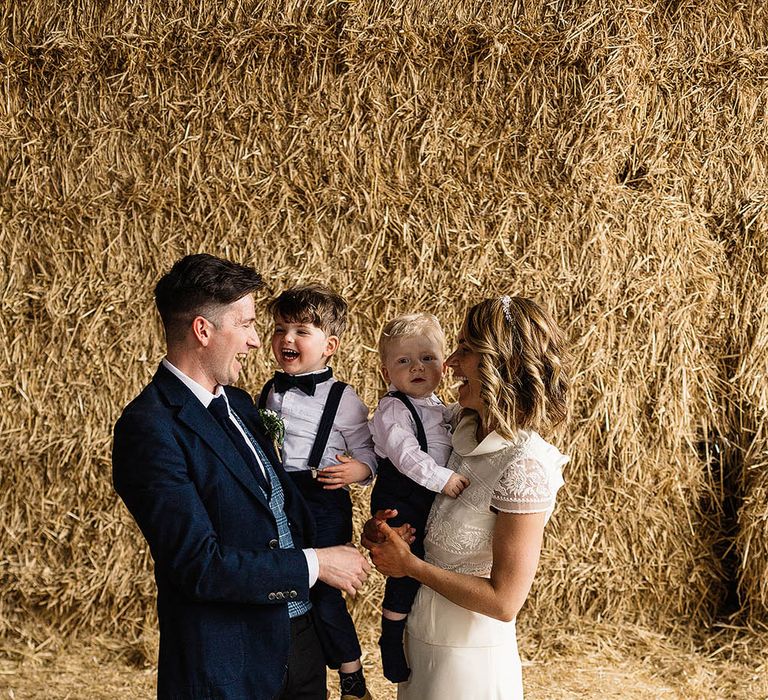 Bride In Bespoke Silk Cami & Skirt By Emma Beaumont At Owen House Wedding Barn With Bridesmaids In Blush Pink & Images From Paul Joseph Photography