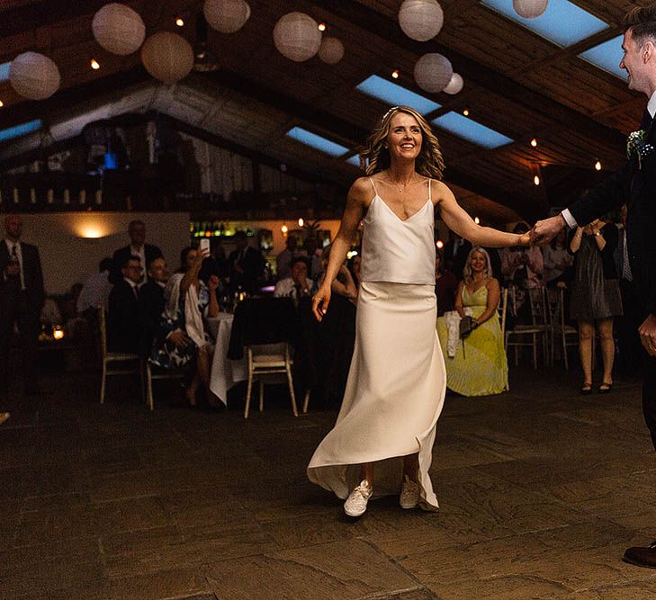 Bride In Bespoke Silk Cami & Skirt By Emma Beaumont At Owen House Wedding Barn With Bridesmaids In Blush Pink & Images From Paul Joseph Photography