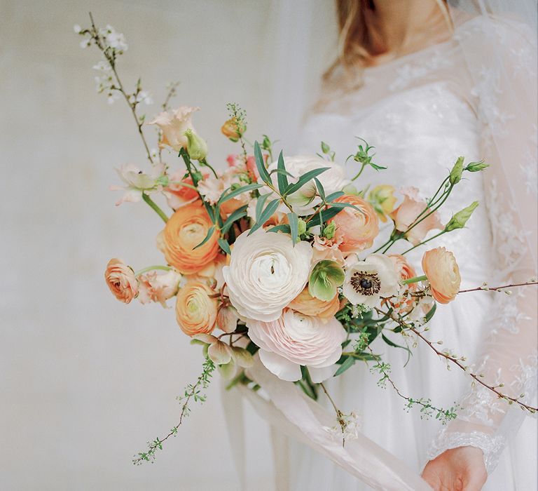 Organic & Textural Bridal Bouquet With Anemones & Coral Accents