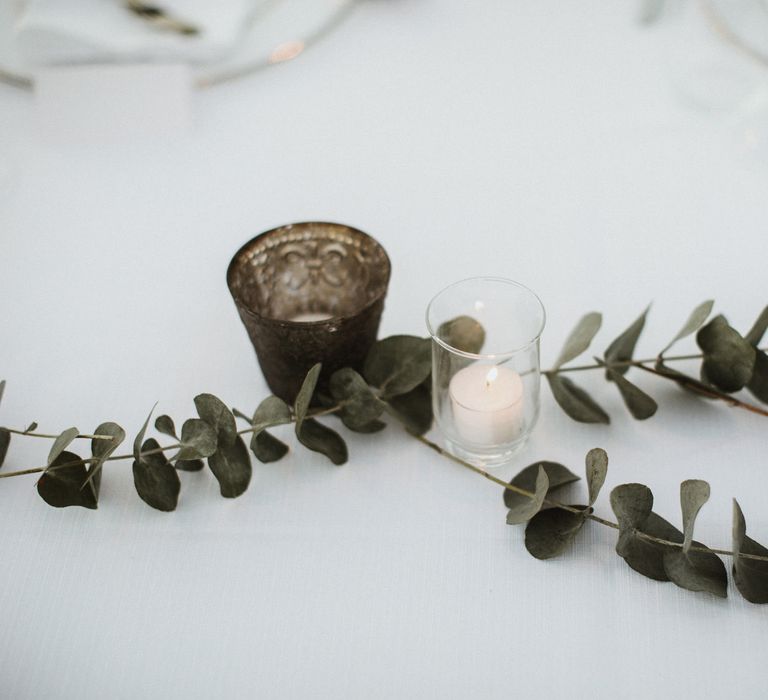 White Linen, Pink & Green Flowers With Olive Branches For Wedding Decor // Elegant Destination Wedding In Tuscany At San Galgano Abbey With Bride In Bespoke Dress By Madame Paulette With Images From James Frost Photography