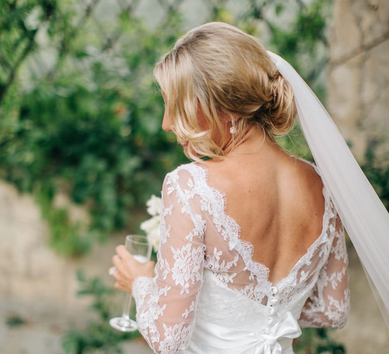 Bride in Suzanne Neville Victoriana Wedding Dress