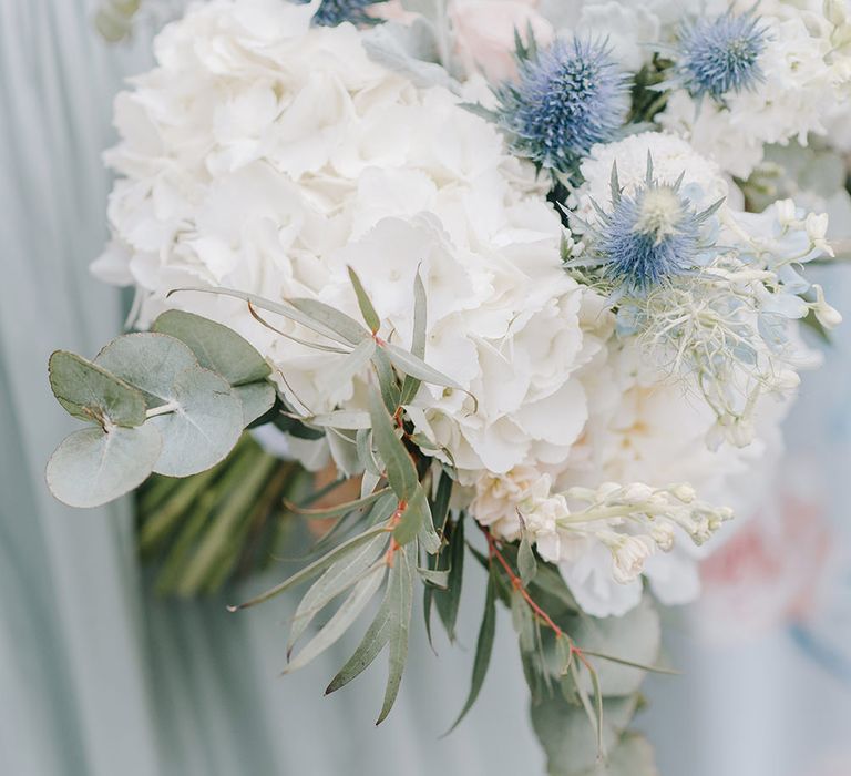 White Hydrangea & Thistle Bouquet | Classic Blue & White Wedding at Prestwold Hall in Loughborough | Georgina Harrison Photography