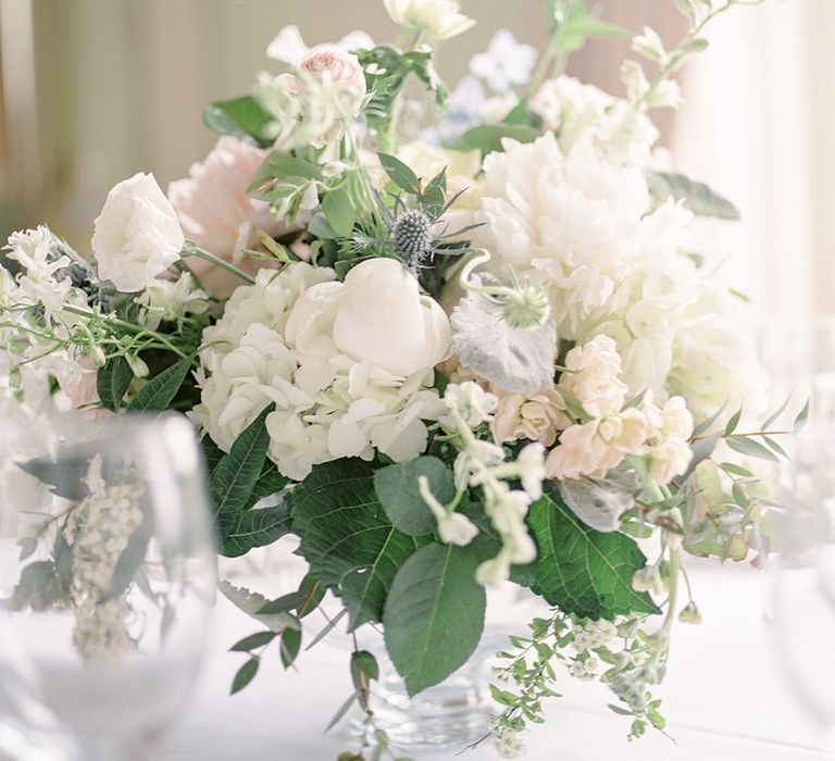 Floral Centrepiece | Classic Blue & White Wedding at Prestwold Hall in Loughborough | Georgina Harrison Photography