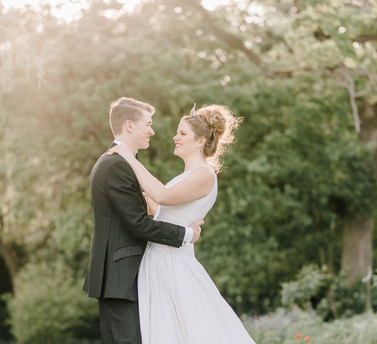 Bride in Dee Hutton Wedding Dress | Groom in Black Tuxedo | Classic Blue & White Wedding at Prestwold Hall in Loughborough | Georgina Harrison Photography