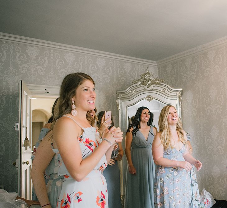 Bridesmaids in Different Coloured Pale Blue Dresses | Classic Blue & White Wedding at Prestwold Hall in Loughborough | Georgina Harrison Photography