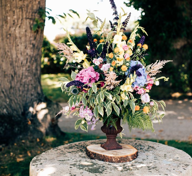 Stunning Floral Arrangement In Urn